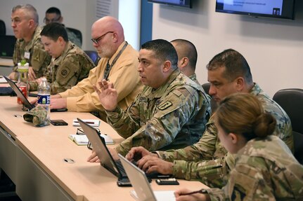 Chief Warrant Officer 4 Vladimir Sequera, maintenance officer for the 30th Medical Brigade, talks during a work group discussion at a table top exercise focusing medical maintenance reform hosted by Army Medical Logistics Command at Fort Detrick on Feb. 24.