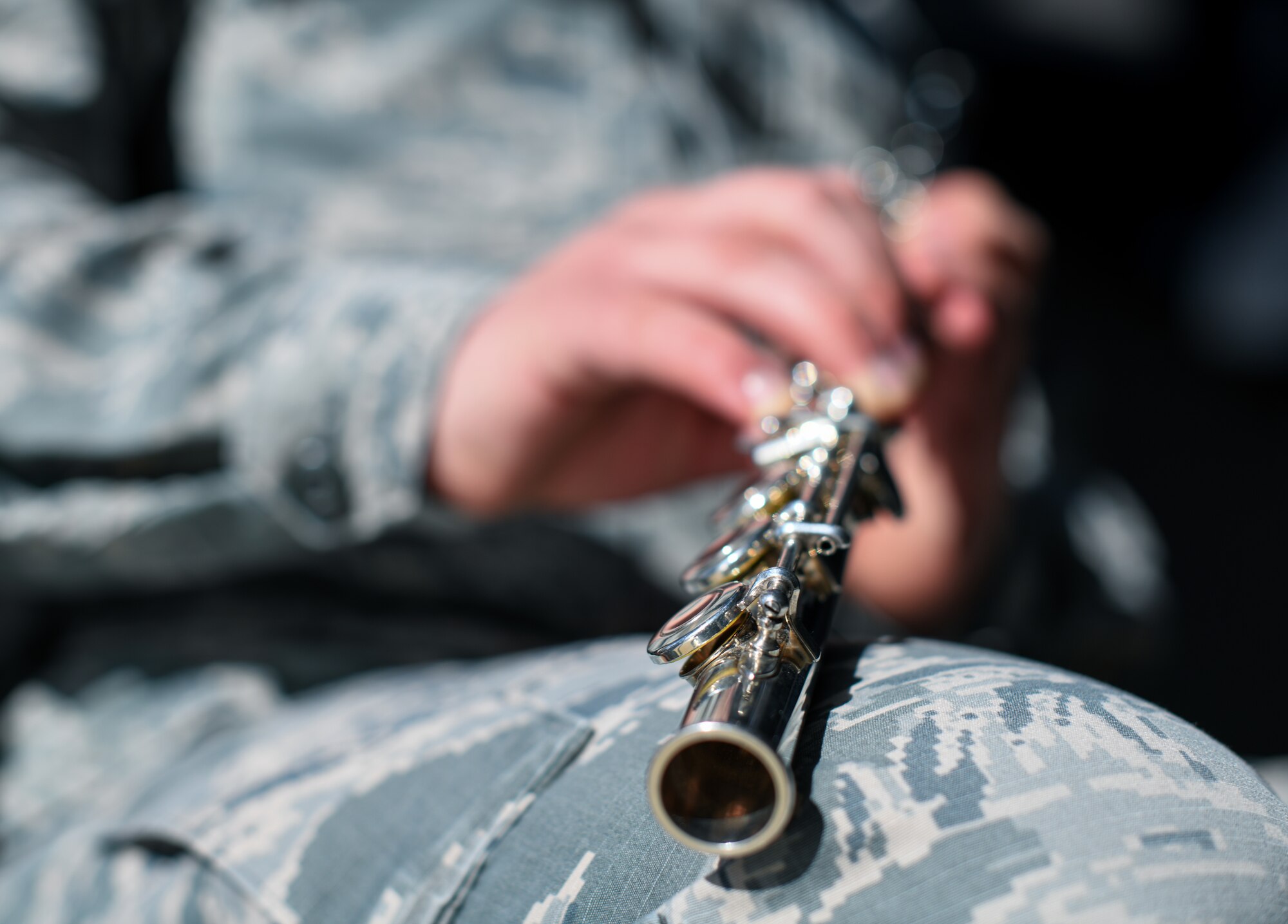 Senior Airman Richard Elefson, an 11th Space Warning Squadron mission management operator, holds his flute, Jan. 10, 2020, at the chapel on Buckley Air Force Base, Colo.