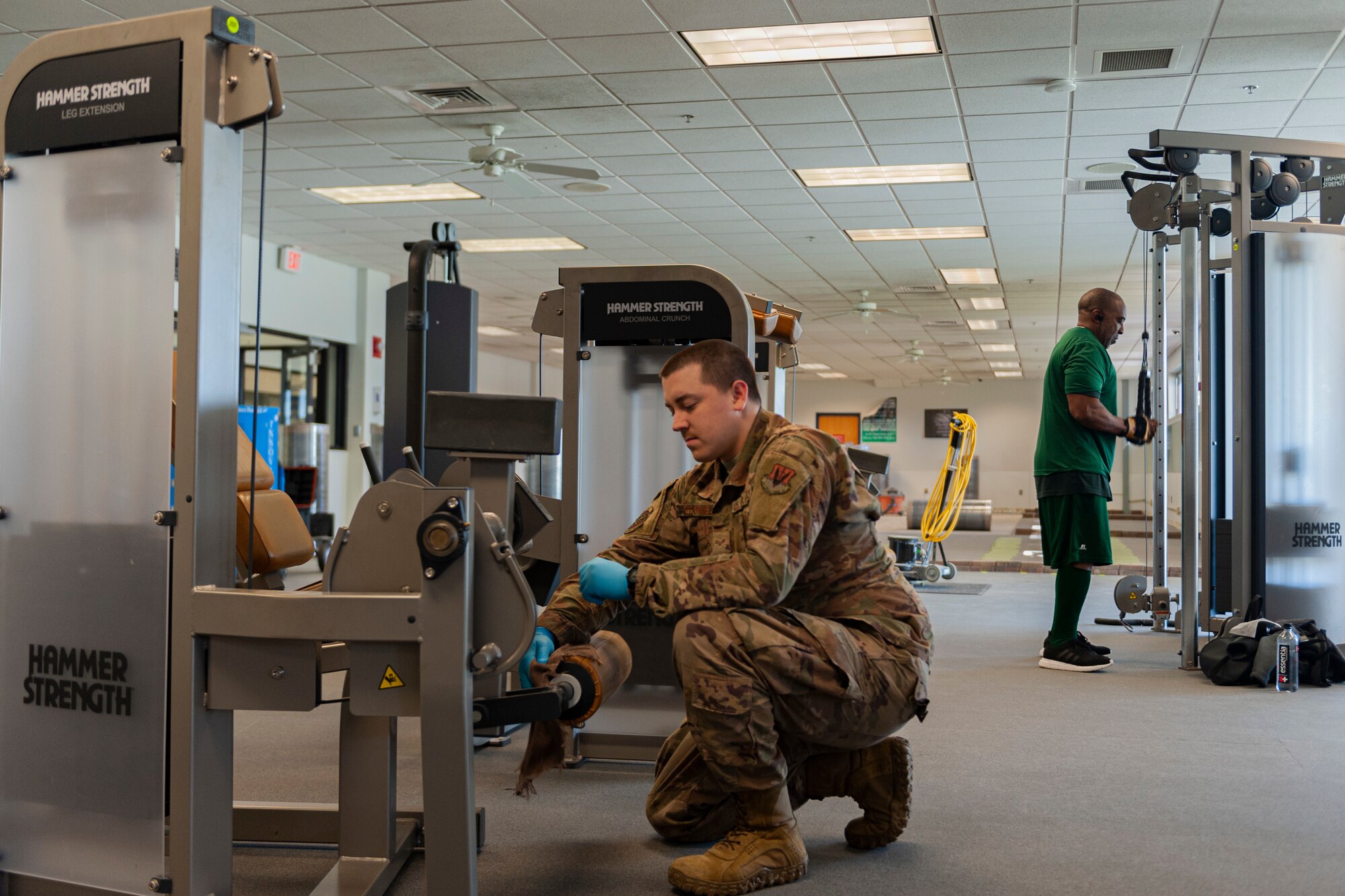 Photo of Airman cleaning equipment