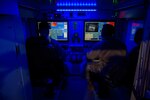 U.S. Army Sgt. Benjamin Yuen, left, and Pfc. Antonio Arriola, with the New Jersey National Guard, inside a ground control station for a RQ-7B Shadow unmanned aerial system on Joint Base McGuire-Dix-Lakehurst, N.J., Feb. 10, 2020. The “Sky Devils” provide surveillance and communication relays for ground forces during combat.
