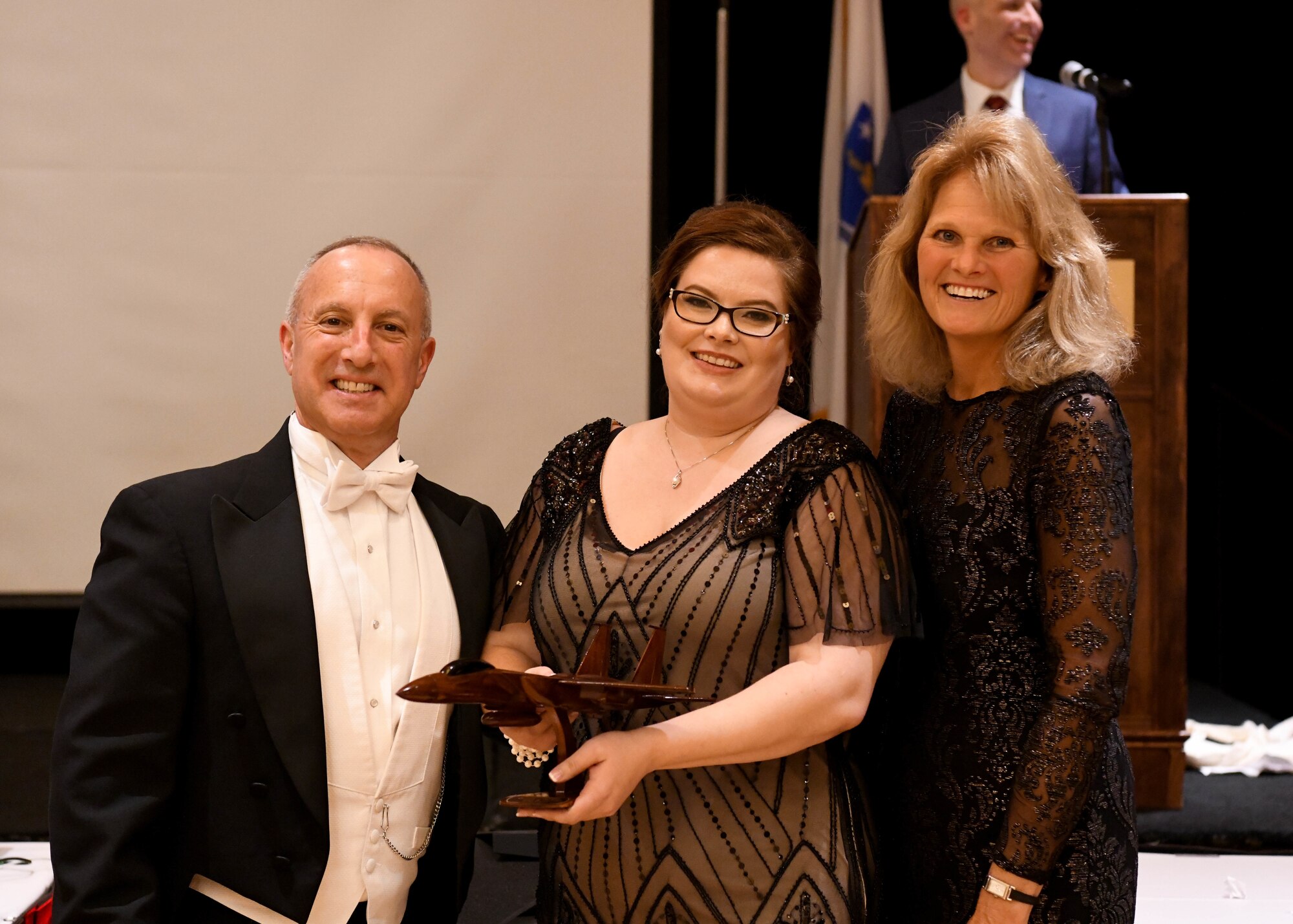 Lisa Potito, 104th Airman and Family Readiness center manager, recieved the wing civilian of the year award during the annual awards banquet, January 11, 2020, Springfield, Massachusetts. To kick off the new year, the banquet was themed 1920s. (U.S. Air National Guard Photo by Airman Camille Lienau)
