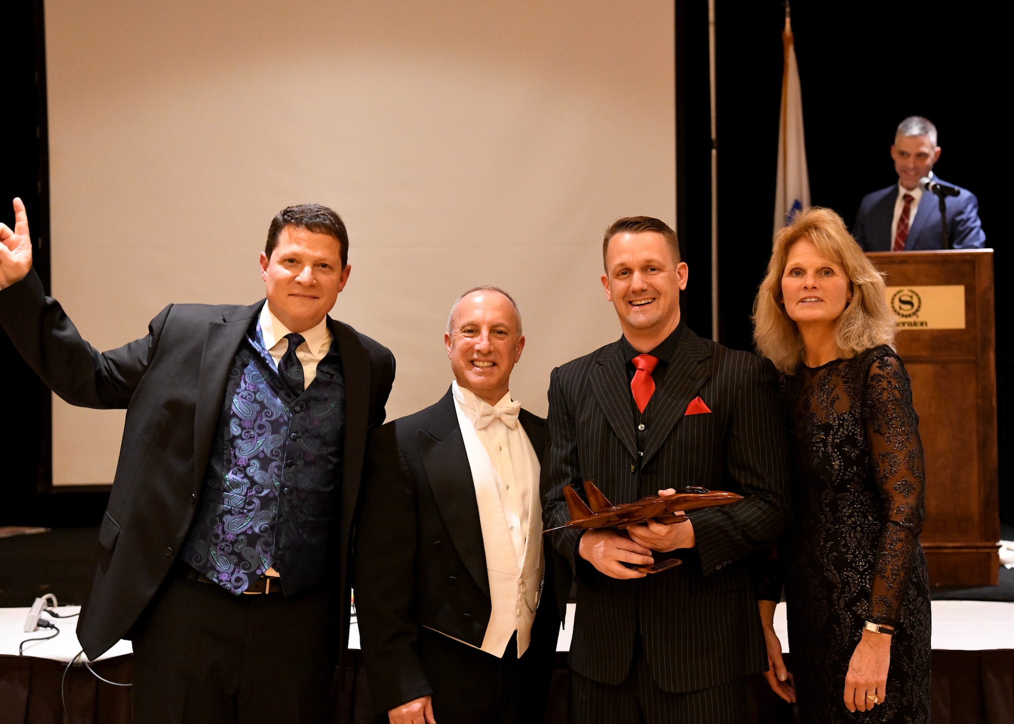 Captain Jason Hickox, 104th Maintenance Squadron commander, recieved the wing company grade officer of the year award during the annual awards banquet, January 11, 2020, Springfield, Massachusetts. To kick off the new year the banquet was themed 1920s. (U.S. Air National Guard Photo by Airman Camille Lienau)