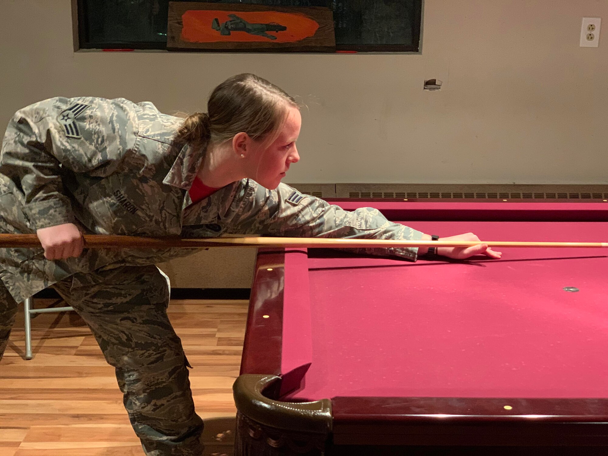 Members of the 104th Fighter Wing took part in the 104th Fighter Wing’s Enlisted vs. Officers Olympics, Feb. 1, 2020. Airmen of all ranks participated in a friendly competition of darts, shuffleboard, corn hole, foosball, giant Jenga, flip cup, and pool to bring the wing’s team members together for camaraderie. (U.S. Air National Guard photo by Senior Master Sgt. Julie Avey)