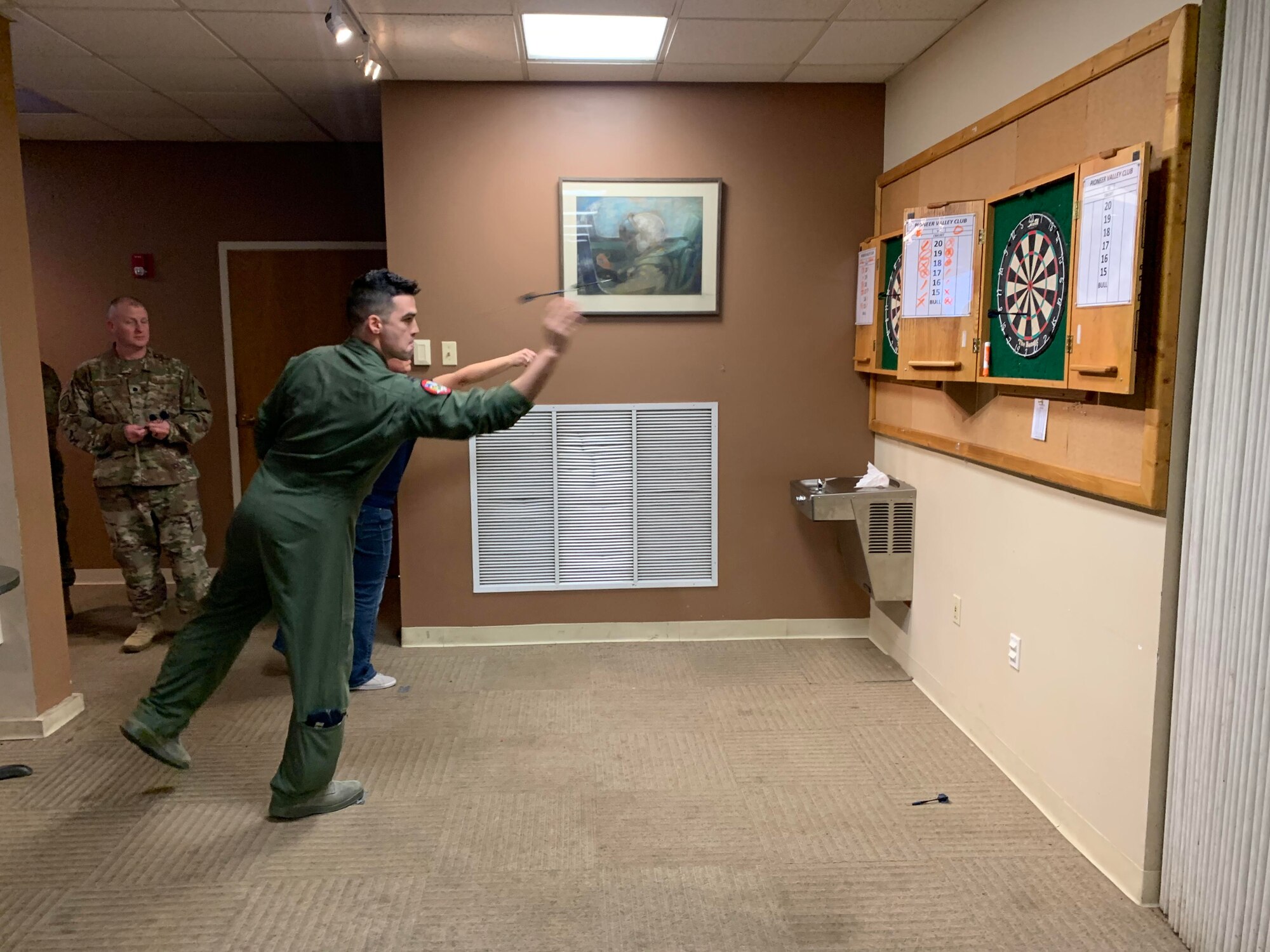 Members of the 104th Fighter Wing took part in the 104th Fighter Wing’s Enlisted vs. Officers Olympics, Feb. 1, 2020. Airmen of all ranks participated in a friendly competition of darts, shuffleboard, corn hole, foosball, giant Jenga, flip cup, and pool to bring the wing’s team members together for camaraderie. (U.S. Air National Guard photo by Senior Master Sgt. Julie Avey)
