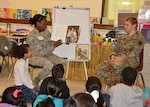 DLA Aviation military members read to elementary school students