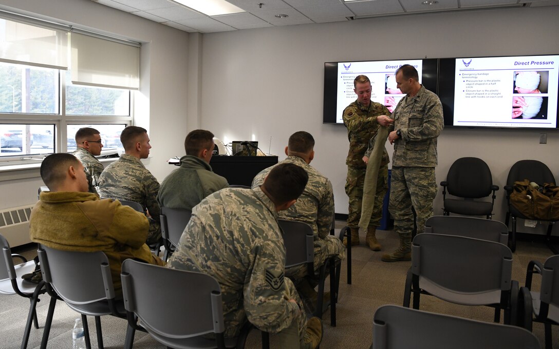 The 104th Medical Group held Self Aid and Buddy Care Feb. 2, 2020, at Barnes Air National Guard Base.   Staff Sgt. Michael Reynolds and Lt. Col. Stephen Reynolds lead the class and gave their students hands-on experience using a tourniquet and other SABC tools.   (U.S Air National Guard Photos by Master Sgt. Lindsey Sarah Watson-Kirwin)