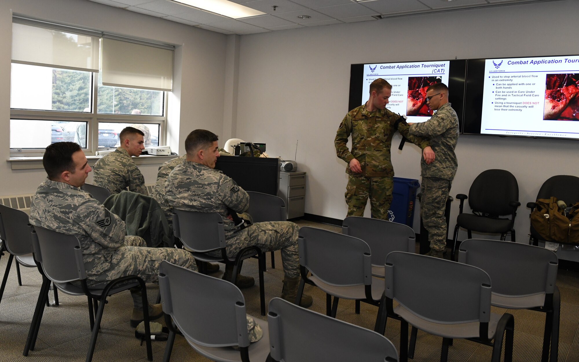 The 104th Medical Group held Self Aid and Buddy Care Feb. 2, 2020, at Barnes Air National Guard Base.   Staff Sgt. Michael Reynolds and Lt. Col. Stephen Reynolds lead the class and gave their students hands-on experience using a tourniquet and other SABC tools.   (U.S Air National Guard Photos by Master Sgt. Lindsey Sarah Watson-Kirwin)