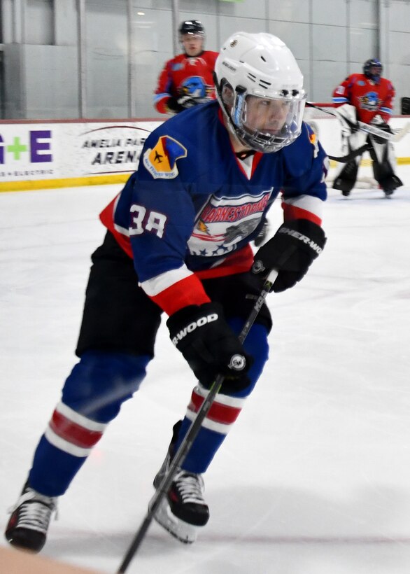 Master Sgt. Andrew Caron, 104th Fighter Wing Barnestormer player, played hockey against the Springfield Thunderbirds Charity team in order to raise money for an organization aimed at spreading awarness for veteran suicide Feb. 2, 2020, in Westfield, Massachusetts. The hockey game built camaraderie amongst Airmen and allowed them with an opportunity to support military veterans. (U.S. Air National Guard photo by Airman 1st Class Sara Kolinski)