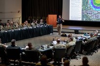 Joint Task Force Civil Support (JTF-CS) J5 Deputy Director Stan Bacon gives a brief to Mission Planning Conference (MPC) attendees at Jacobs Conference Center.