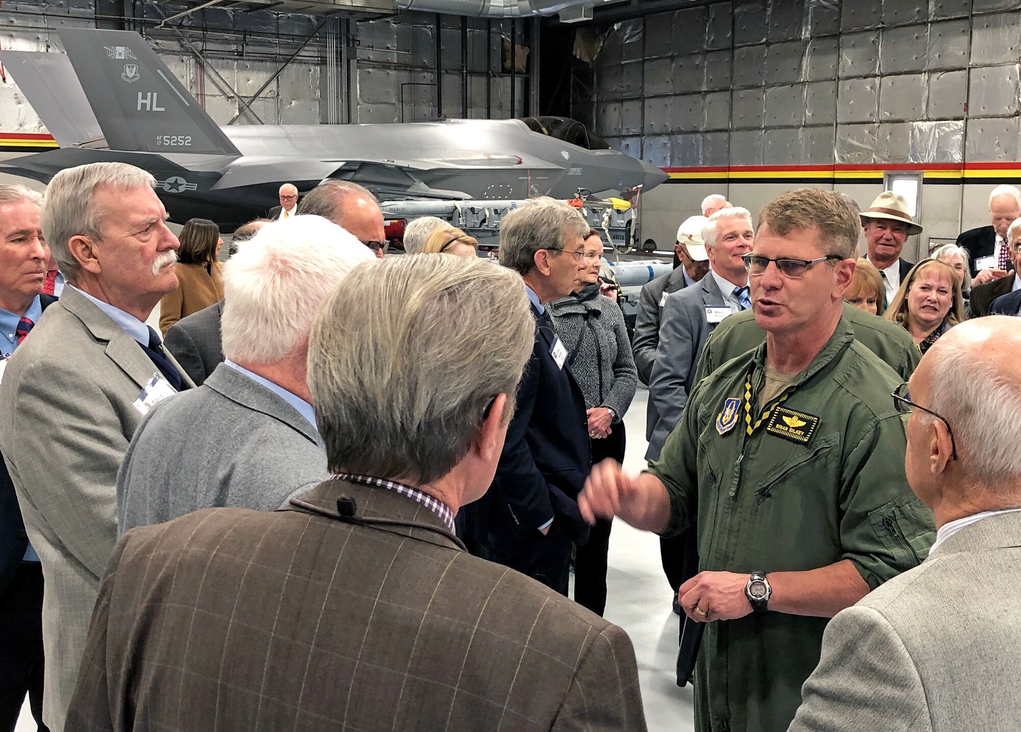Col. Brian Silkey, 419th Fighter Wing vice commander, explains the F-35A Lightning II to a group of local and national community leaders