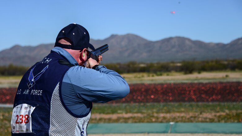 Airman shoots at a clay target