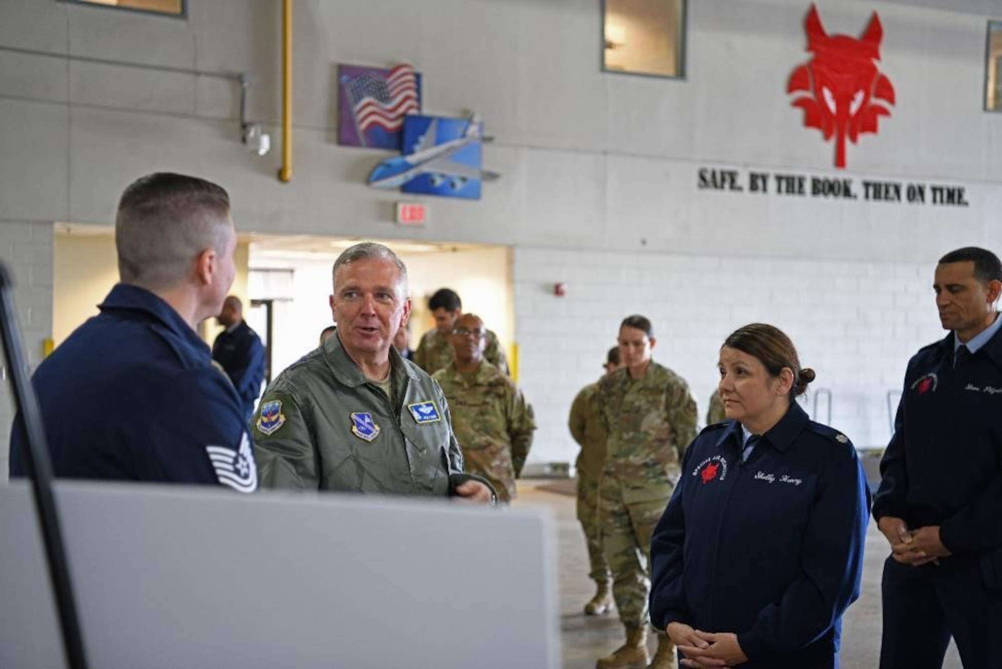 Air Force District of Washington Commander Maj. Gen. Ricky N. Rupp, middle, speaks with members of the 89th Aerial Port Squadron during an 89th Airlift Wing Immersion Tour on Joint Base Andrews, Maryland, Feb. 28, 2020. Rupp, and other leaders of AFDW and the 11th Wing were invited to the tour to help familiarize themselves with the mission and operations of the 89th Airlift Wing. Rupp is also the 320th Air Expeditionary Wing commander, a provisional unit of AFDW. (U.S. Air Force photo by Tech. Sgt. Kentavist P. Brackin)