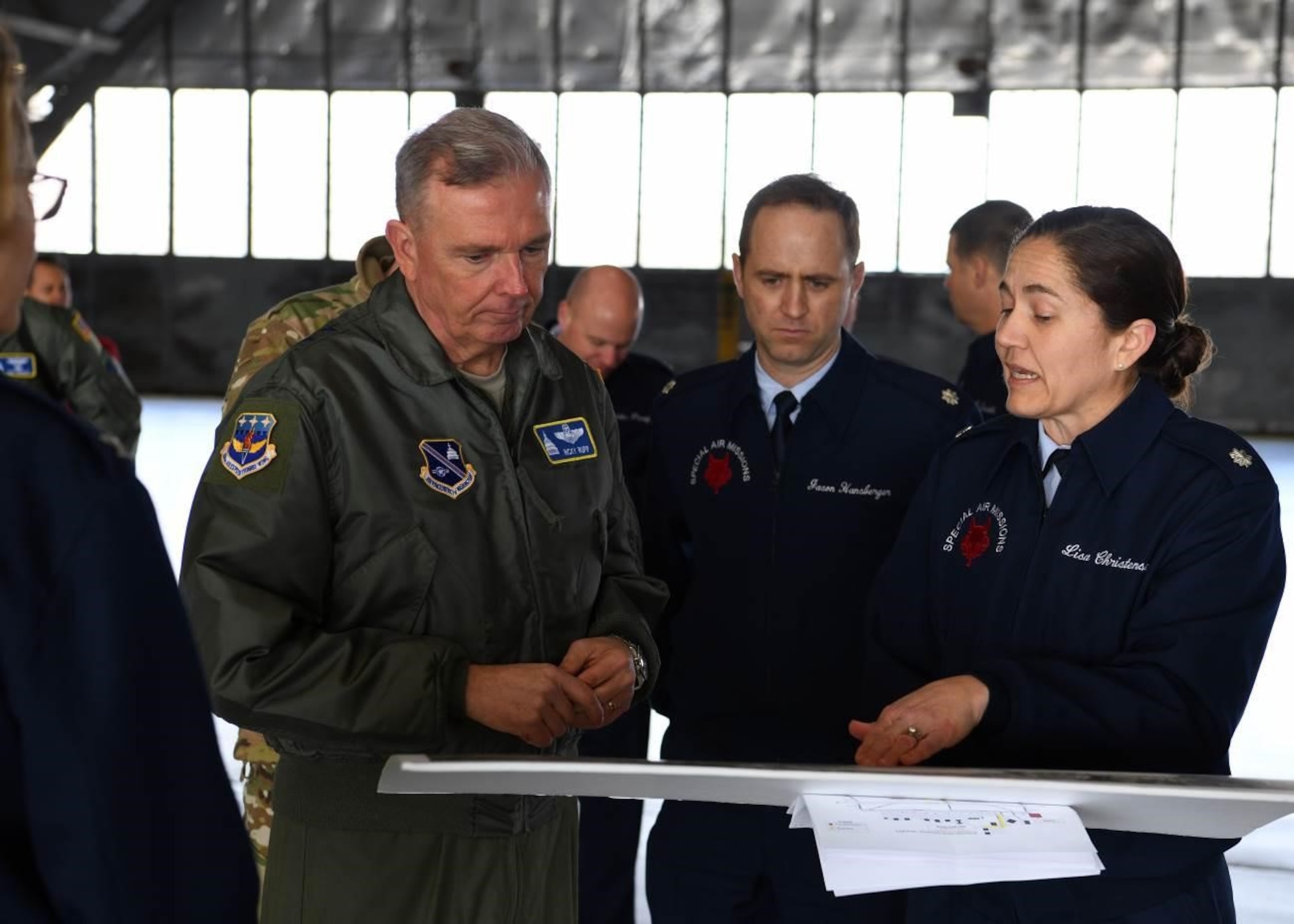 Lt. Col. Lisa Christensen, 89th Operations Support Squadron commander, right, briefs the capabilities of the C-32A aircraft to Maj. Gen. Ricky N. Rupp, Air Force District of Washington and 320th Air Expeditionary Wing commander, left, during an 89th Airlift Wing Immersion Tour on Joint Base Andrews, Maryland, Feb. 28, 2020. During the tour, Rupp, and other leaders of AFDW and the 11th Wing received a wing mission briefing, visited the wing’s communication and aerial port squadrons, and a toured a of the C-32A aircraft. (U.S. Air Force photo by Tech. Sgt. Kentavist P. Brackin)