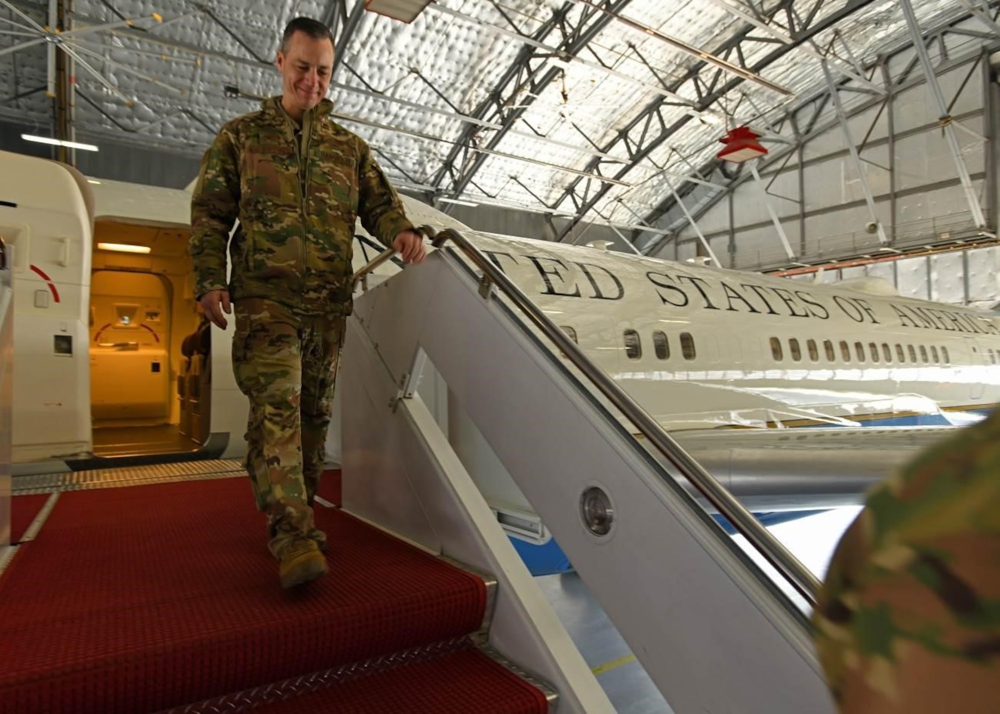 Col. Robby Hanovich, Air Force District of Washington and 320th Air Expeditionary Wing deputy commander, departs a C-32A aircraft during an 89th Airlift Wing Immersion Tour on Joint Base Andrews, Maryland, Feb. 28, 2020. The C-32A transports high-priority personnel and has the distinctive call sign “Air Force Two” when moving the vice president. It also transports the first lady, members of the cabinet, and Congress. (U.S. Air Force photo by Tech. Sgt. Kentavist P. Brackin)