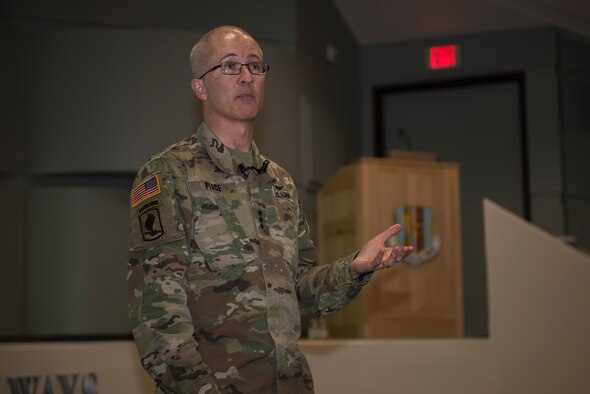 U.S. Army Lt. Gen. Ronald J. Place, Defense Health Agency director, speaks to David Grant Medical USAF Center personnel during a town hall meeting Feb. 27, 2020, at Travis Air Force Base, California. Place discussed the connection between having a medically ready force, a ready medical force, satisfied patients and a fulfilled staff, and took questions from staff.  (U.S. Air Force photo by Airman 1st Class Cameron Otte)