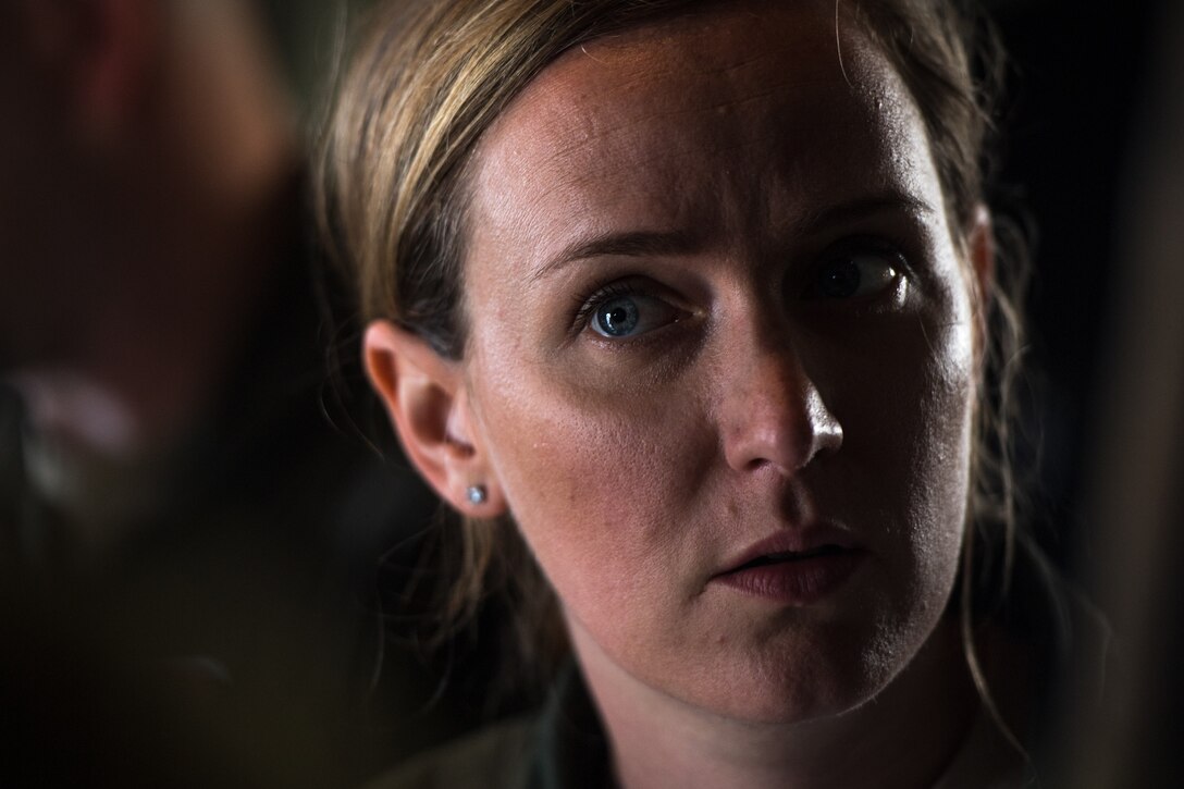 Capt. Leesa Froelich, a pilot assigned to the 815th Airlift Squadron, Keesler Air Force Base, Mississippi, prepares to fly a C-130J Super Hercules for an airdrop of Royal Australian Air Force combat controllers assigned to the 4th Squadron, Bravo flight, during Exercise Cope North 20, Feb. 14, 2020, Andersen Air Force Base, Guam. Cope North 20 is an annual trilateral field training exercise conducted at Andersen Air Force Base, Guam, and around the Commonwealth of the Northern Mariana Islands (CNMI), Palau and Yap in the Federated States of Micronesia. (U.S. Air Force photo by Senior Airman Gracie Lee)