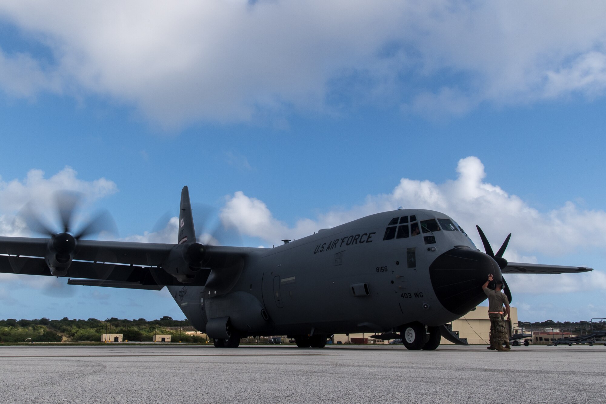 A Reserve Citizen Airman assigned to the 803rd Aircraft Maintenance Squadron, Keesler Air Force Base, Mississippi, preparse a C-130J Super Hercules for take-off during Exercise Cope North 20, Feb. 24, 2020, Andersen Air Force Base, Guam. Cope North 20 is an annual trilateral field training exercise conducted at Andersen Air Force Base, Guam, and around the Commonwealth of the Northern Mariana Islands (CNMI), Palau and Yap in the Federated States of Micronesia. (U.S. Air Force photo by Senior Airman Gracie Lee)