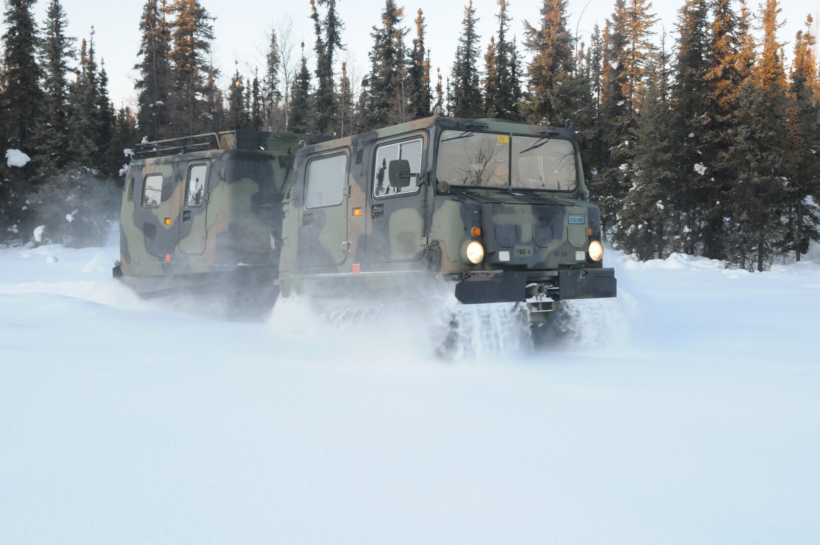 A Small Unit Support Vehicle Drives through the Yukon Training Area on Eielson Air Force Base, Alaska, Feb. 27, 2020, as part of exercise Arctic Eagle 2020.