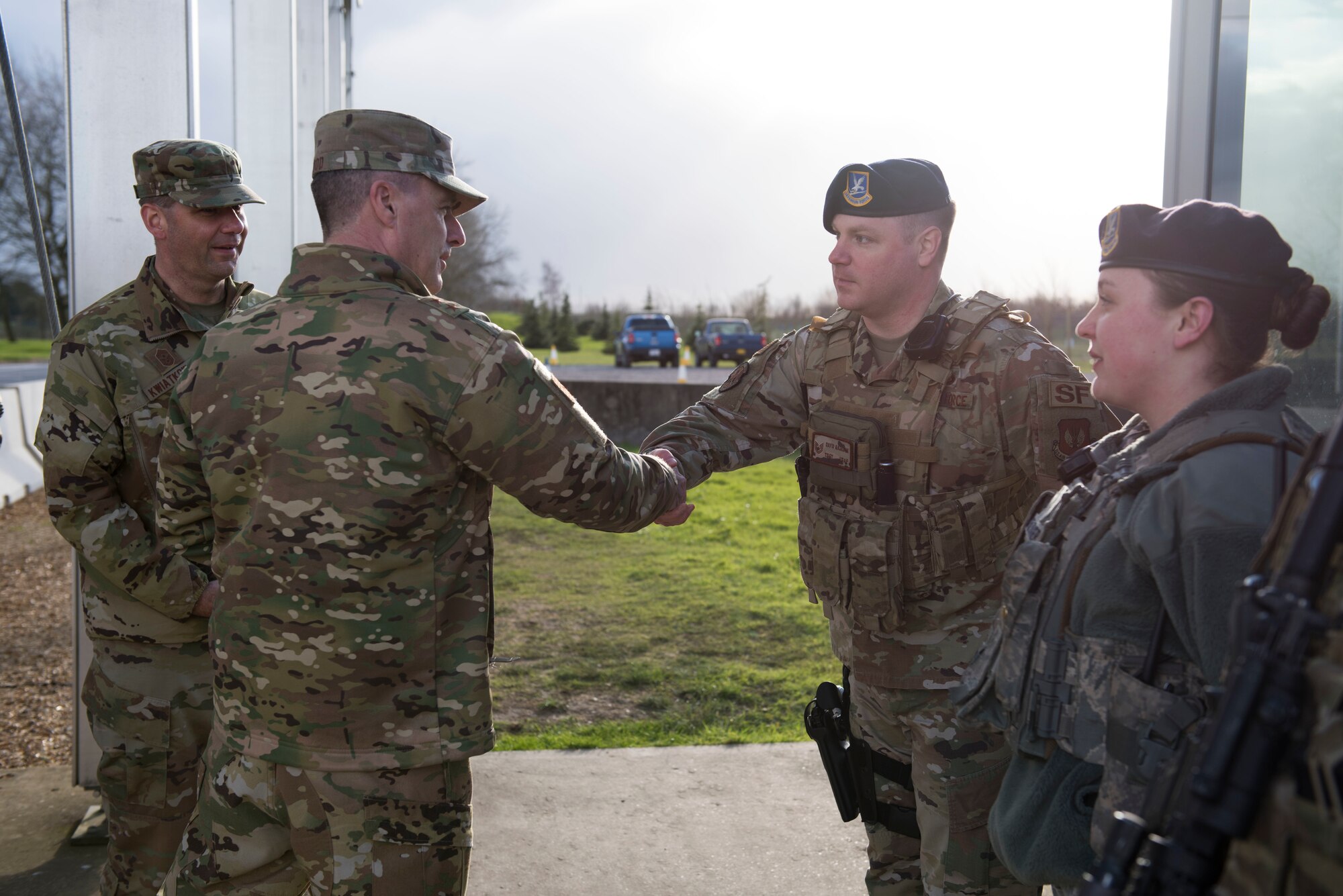 U.S. Air Force Maj. Gen. John Wood, Third Air Force commander, greets Tech. Sgt. David Gajeske, 423rd Security Forces Squadron flight sergeant, during a tour at the RAF Alconbury main gate, England, March 3, 2020. Wood and Chief Master Sgt. Randy Kwiatkowski, Third Air Force command chief, visited 501st Combat Support Wing Airmen and facilities and recognized outstanding performers in the wing. (U.S. Air Force photo by Airman 1st Class Jennifer Zima)