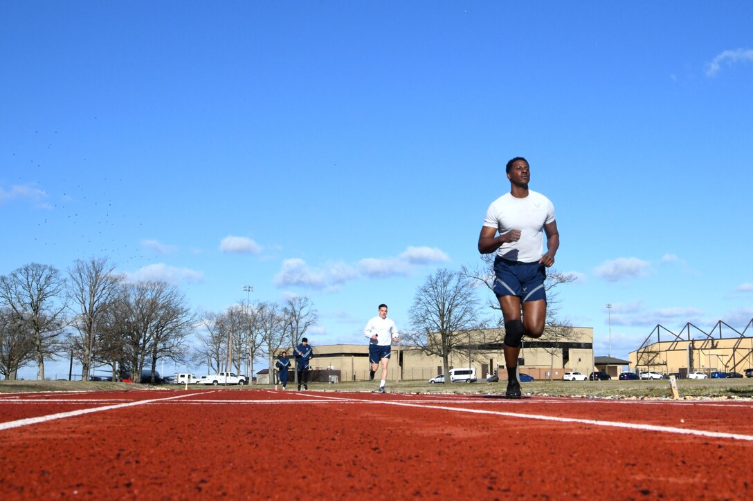 11th Wing Security Forces Group Airmen run a timed two-mile run during the Defender Challenge 2020 tryouts at Joint Base Andrews, Md., Feb. 27, 2020. The defenders competed for the opportunity to represent the Air Force District of Washington in DC2020 at Camp Bullis, San Antonio, Texas. The challenge will give the Air Force and partnering allies such as the Royal Air Force, the German Luftwaffe, the Royal Australian Air Force and the Royal Canadian Air Force a way to showcase their military police capabilities and joint interoperability. (U.S. Air Force photo by Staff Sgt. Andrew Walck)