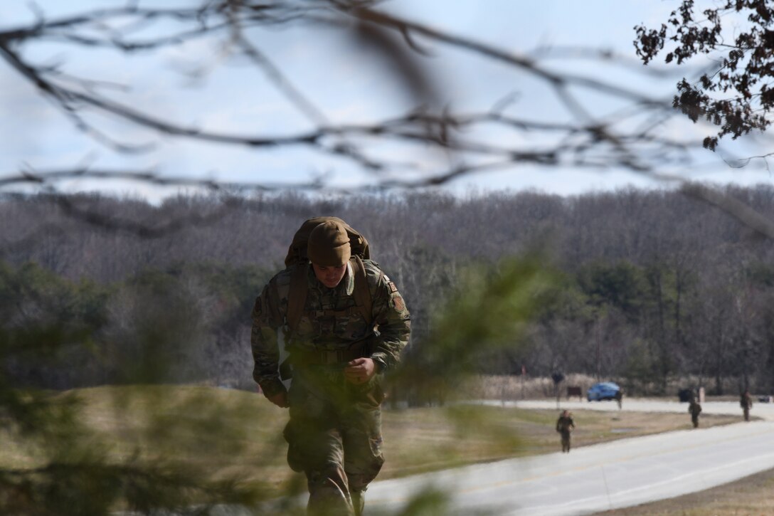 11th Wing Security Forces Group Airmen participate in the ruck-march during the Defender Challenge 2020 tryouts at Joint Base Andrews, Md., Feb. 27, 2020. JBA defenders competed for an opportunity to represent Air Force District of Washington team in the DC2020 in Camp Bullis, San Antonio, Texas. (U.S. Air Force photo by Staff Sgt. Jason Huddleston)