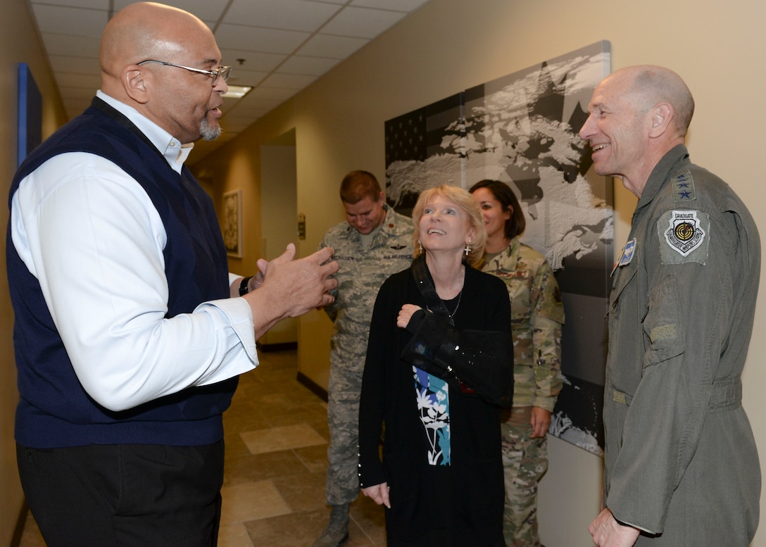 Luther Allen talks with U.S. Air Force Gen. Mike Holmes, commander of Air Combat Command, prior to being recognized as a superior performer and being presented with Holmes’ commander’s coin Feb. 25, 2020, at Tyndall Air Force Base, Florida.