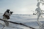 A U.S. Marine fires at a notional enemy during exercise Snow Panzer in Setermoen, Norway, Feb. 25.