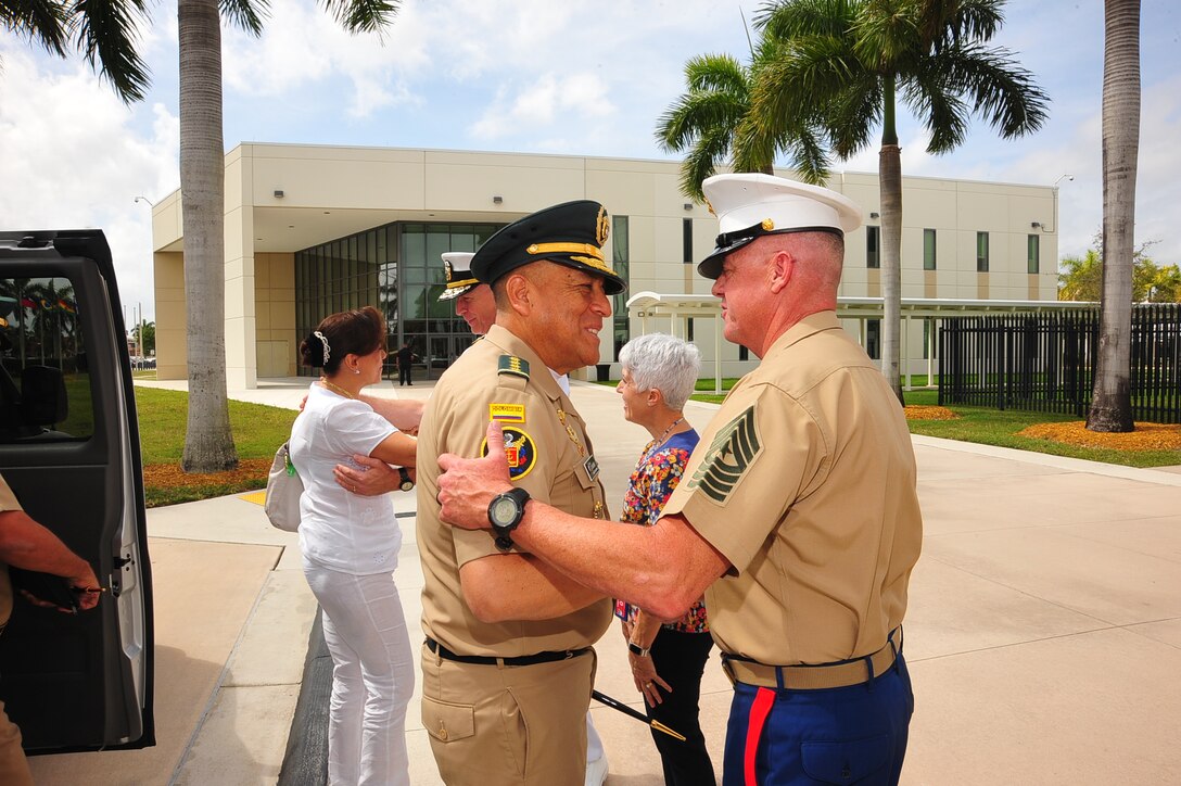 Marine Sgt. Maj. Bryan K Zickefoose, the Command Senior Enlisted Leader of U.S. Southern Command, greets Colombia's Chief of Defense Gen. Luis Navarro Jiménez.