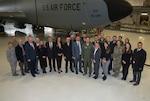 Nine mayors and other delegates from Kosovo in front of a U.S. Air Force KC-135 Statotanker at the 185th Air Refueling Wing in Sioux City, Iowa, Feb. 26, 2020. The group came to Iowa to formalize a sister-city agreement between the city of Gjilian and Sioux City as an outgrowth of the National Guard State Partnership Program.