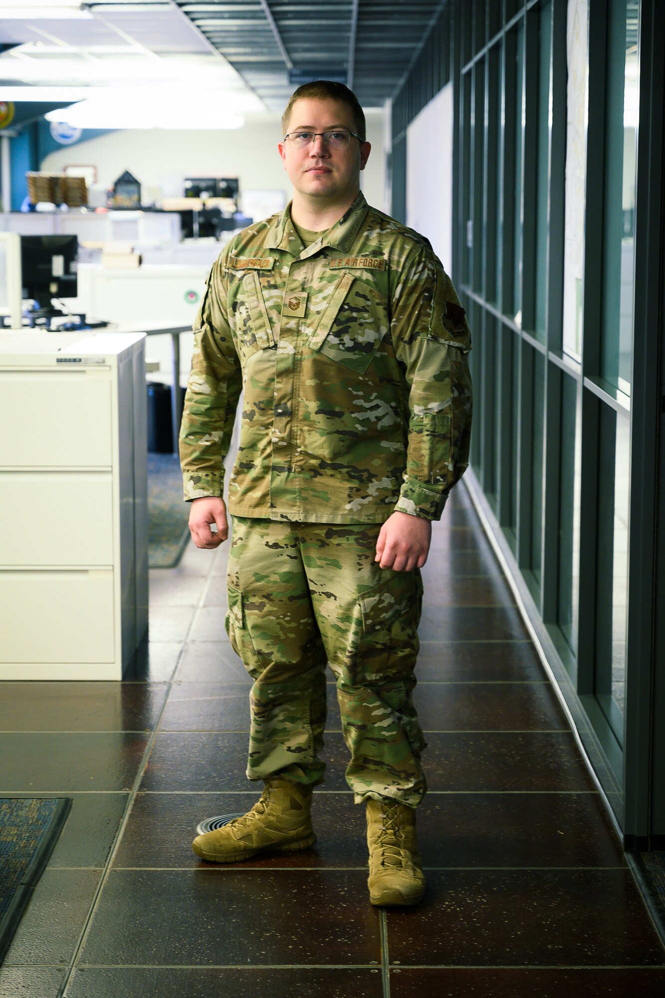 U.S. Air Force Master Sgt. Brandon Louderback, a 188th CES engineer assistant, March 4, 2020, at Ebbing Air National Guard base, Fort Smith, Ark. Louderback is pushing for greater Geographic Information System (GIS) integration in the Air National Guard after showcasing its ability to reduce manpower to assess damage after an EF-1 tornado tore through the base in 2019. (U.S. Air National Guard photo by Staff Sgt. Matthew Matlock)
