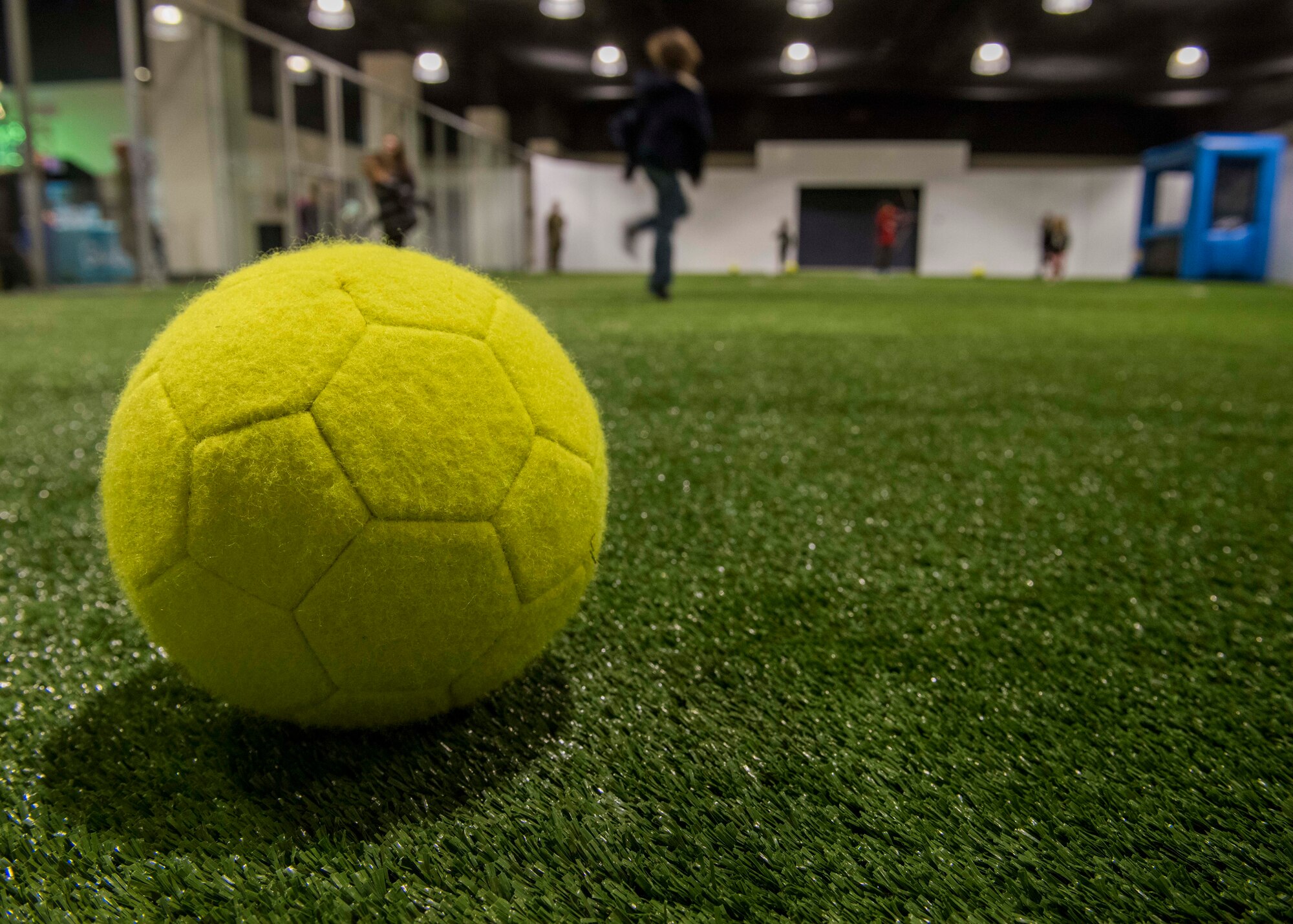 A soccer ball rests on the indoor sports field turf floor at the Alder House, Fairchild’s newest community center, at Fairchild Air Force Base, Washington, March 2, 2020. Units interested in reserving the indoor sports field outside of these hours can do so by calling the Fitness Center at 247-2127. (U.S. Air Force photo by Senior Airman Lawrence Sena)