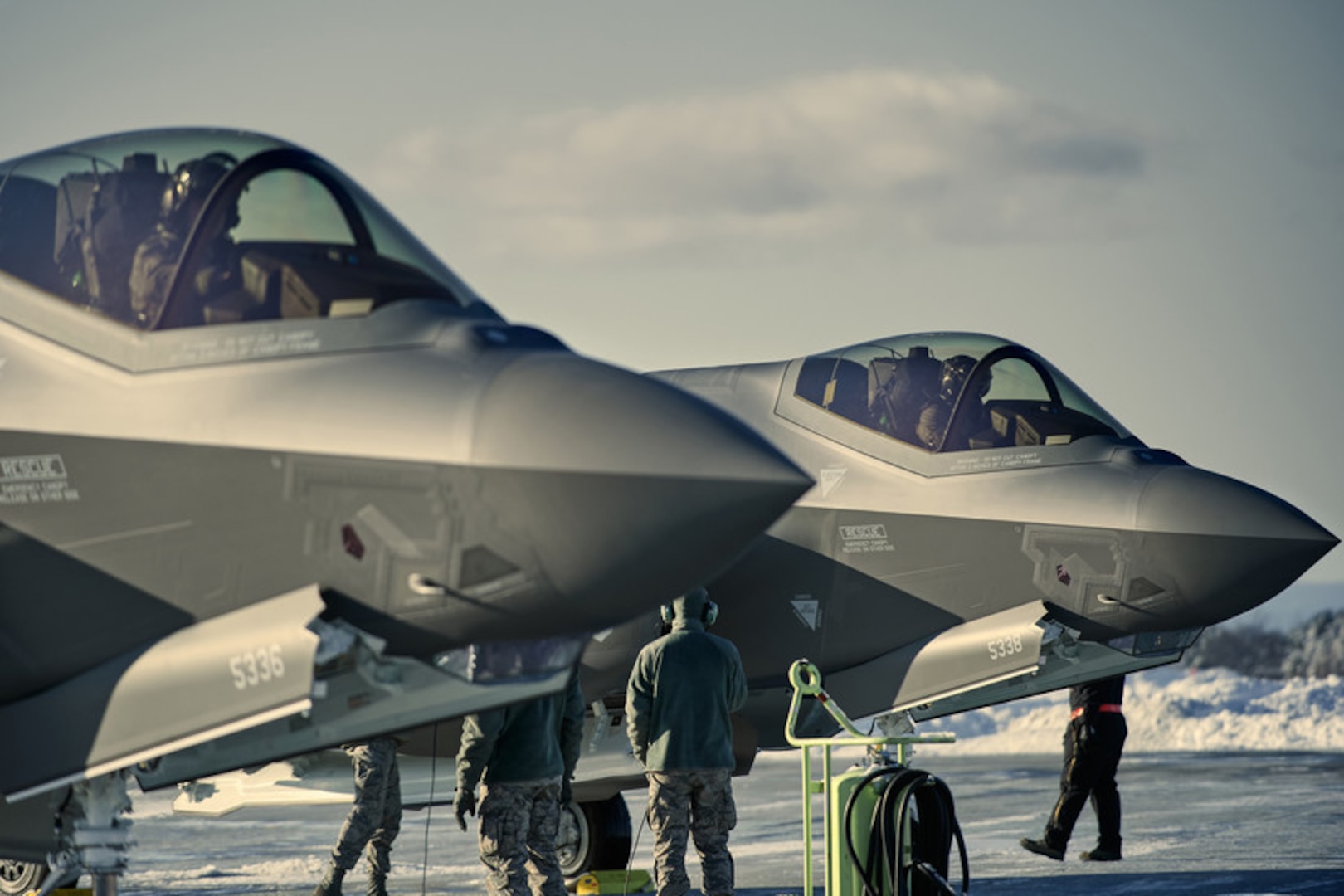 Pilots assigned to the 134th Fighter Squadron, 158th Fighter Wing, Vermont Air National Guard, return to base in their F-35A Lightning IIs during routine flying operations from the Vermont Air National Guard Base, South Burlington, Vt., Feb. 8, 2020.