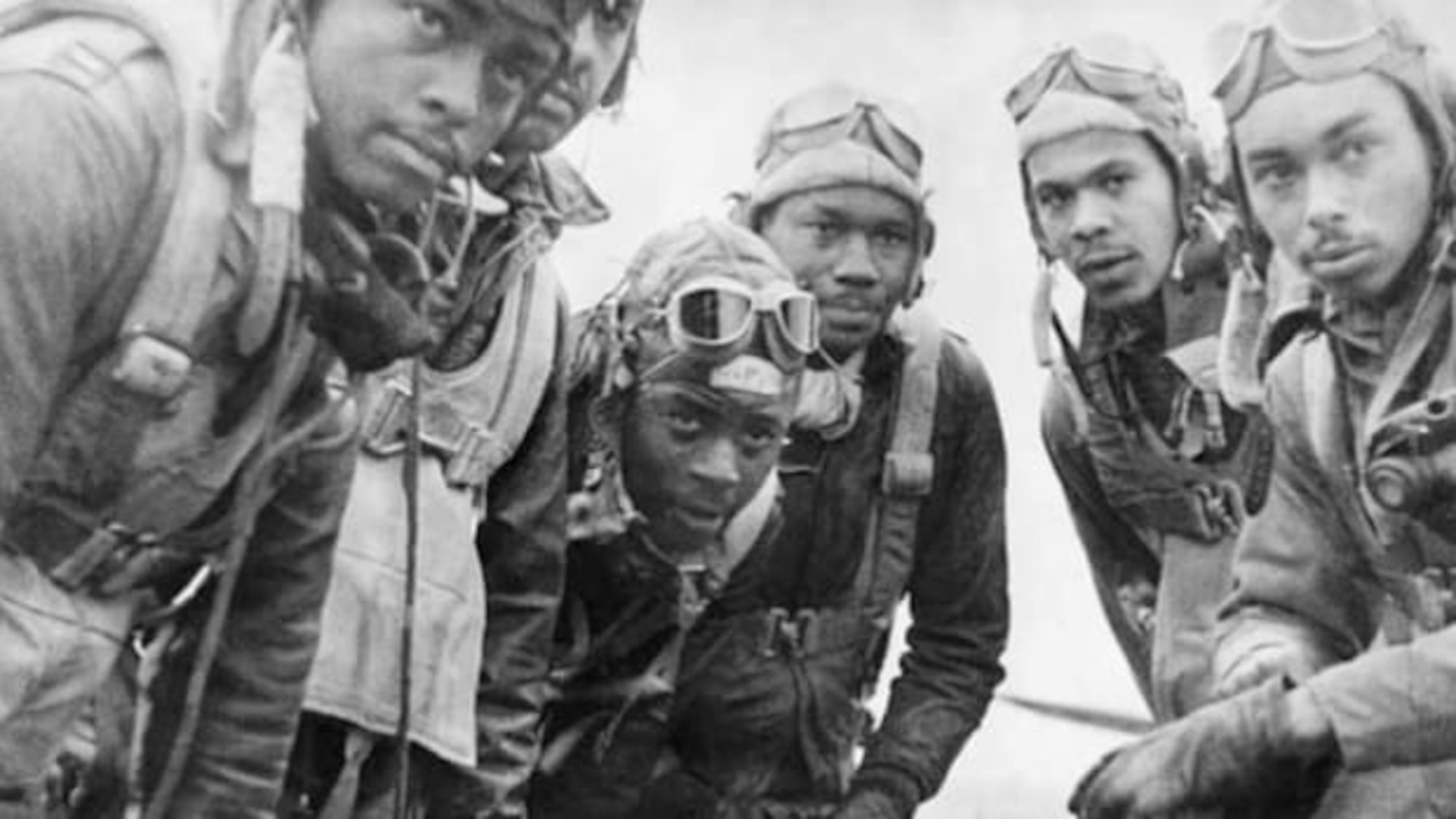 A “selfie” of Tuskegee Airmen on duty. From the History.com