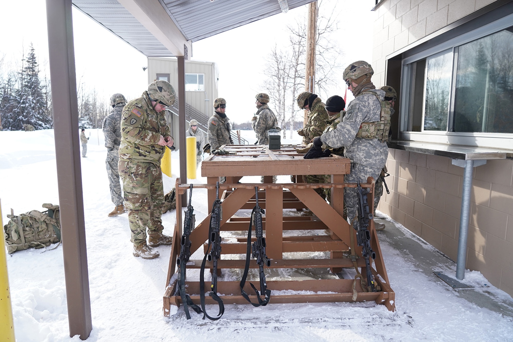 Paratroopers assigned to 1st Battalion, 501st Parachute Infantry Regiment, 4th Infantry Brigade Combat Team (Airborne), 25th Infantry Division, U.S. Army Alaska, qualify with M-4 carbines on Joint Base Elmendorf-Richardson, Alaska, March 3, 2020.