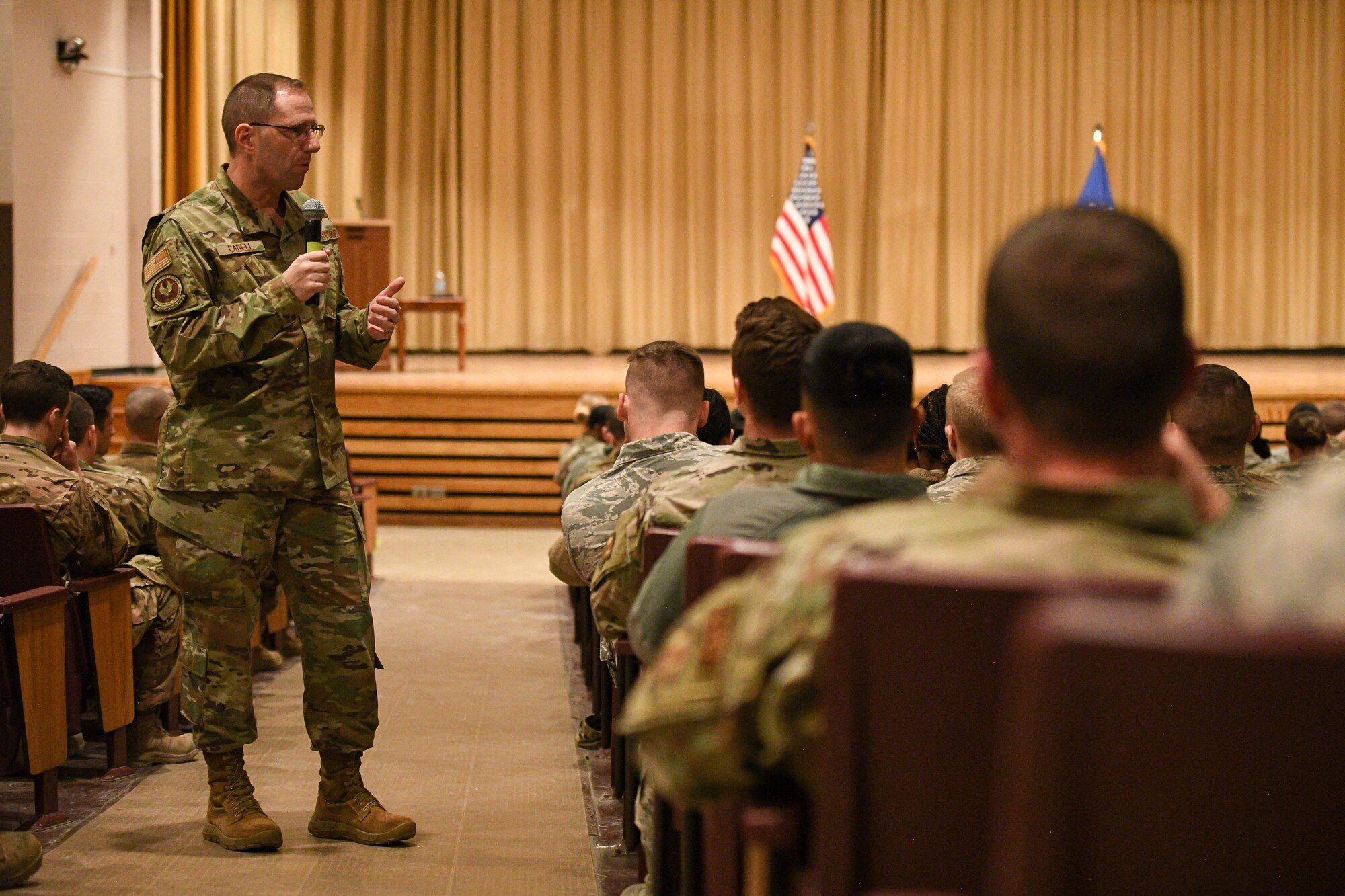 Chief Master Sgt. Stanley C. Cadell, Air Force Materiel command chief, speaks with Airmen during a town hall meeting at Hill Air Force Base, Utah, March 2, 2020. Cadell visited Hill AFB March 1-3 to tour facilities and meet with the base’s Airmen. (U.S. Air Force photo by R. Nial Bradshaw)