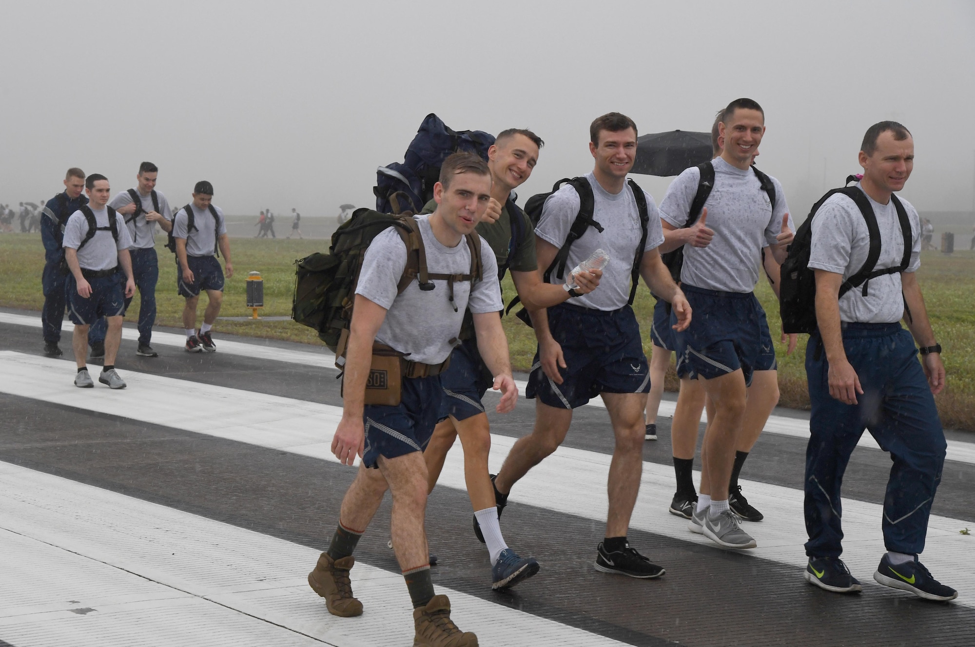 Keesler personnel participate in the Dragons March Fourth ruck march on the flightline at Keesler Air Force Base, Mississippi, March 4, 2020. Keesler personnel carried backpacks during the three-mile walk which symbolized the weight one carries through life. (U.S. Air Force photo by Kemberly Groue)