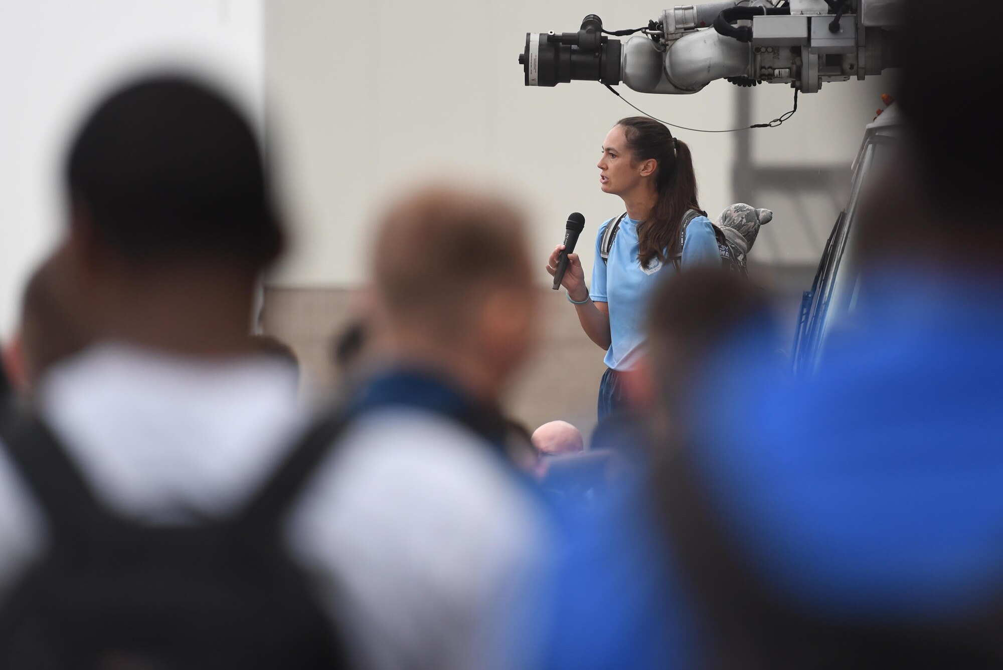 U.S. Air Force Col. Heather Blackwell, 81st Training Wing commander, delivers remarks to Keesler personnel during the Dragons March Fourth ruck march on the flightline at Keesler Air Force Base, Mississippi, March 4, 2020. Keesler personnel carried backpacks during the three-mile walk which symbolized the weight one carries through life. (U.S. Air Force photo by Kemberly Groue)