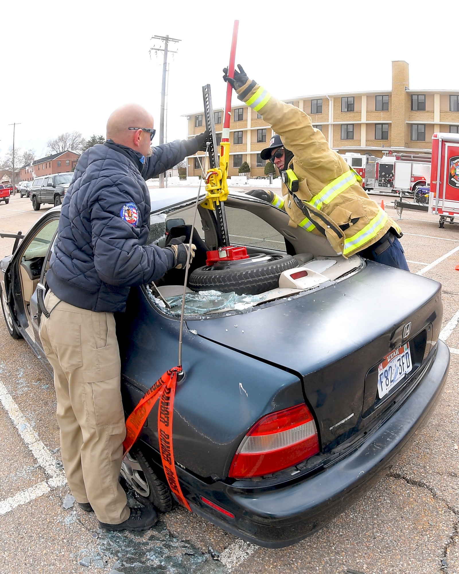 First responders receive instruction on patient extraction from a vehicle during a Rescue Task Force exercise Feb. 12, 2020, at Hill Air Force Base, Utah. The RTF is a tactic used during active shooter/hostile events and consists of “task forces” or integrated teams of security forces defenders and fire and emergency medical services responders working together to provide medical care to victims during an incident much faster. (U.S. Air Force photo by Todd Cromar)