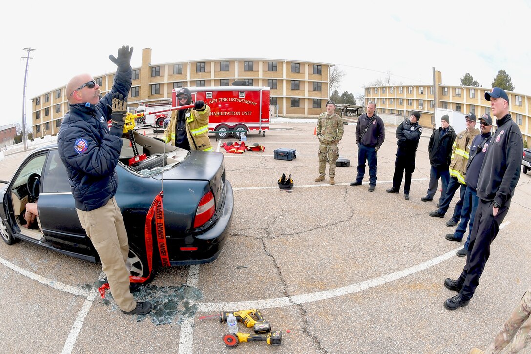 First responders receive instruction on patient extraction from a vehicle during a Rescue Task Force exercise Feb. 12, 2020, at Hill Air Force Base, Utah. The RTF is a tactic used during active shooter/hostile events and consists of “task forces” or integrated teams of security forces defenders and fire and emergency medical services responders working together to provide medical care to victims during an incident much faster. (U.S. Air Force photo by Todd Cromar)