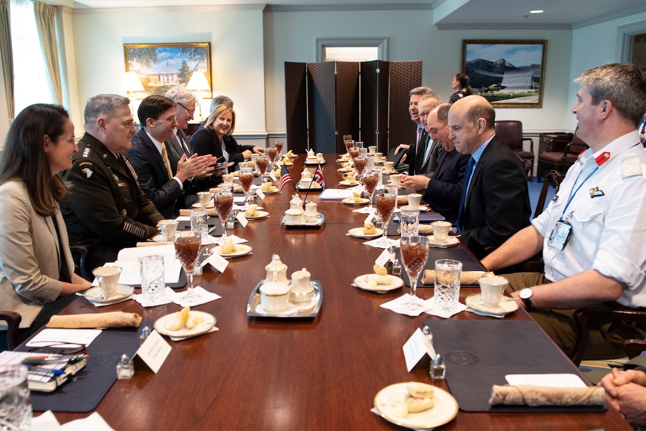 Teams from the U.S. and U.K. meet at the Pentagon.