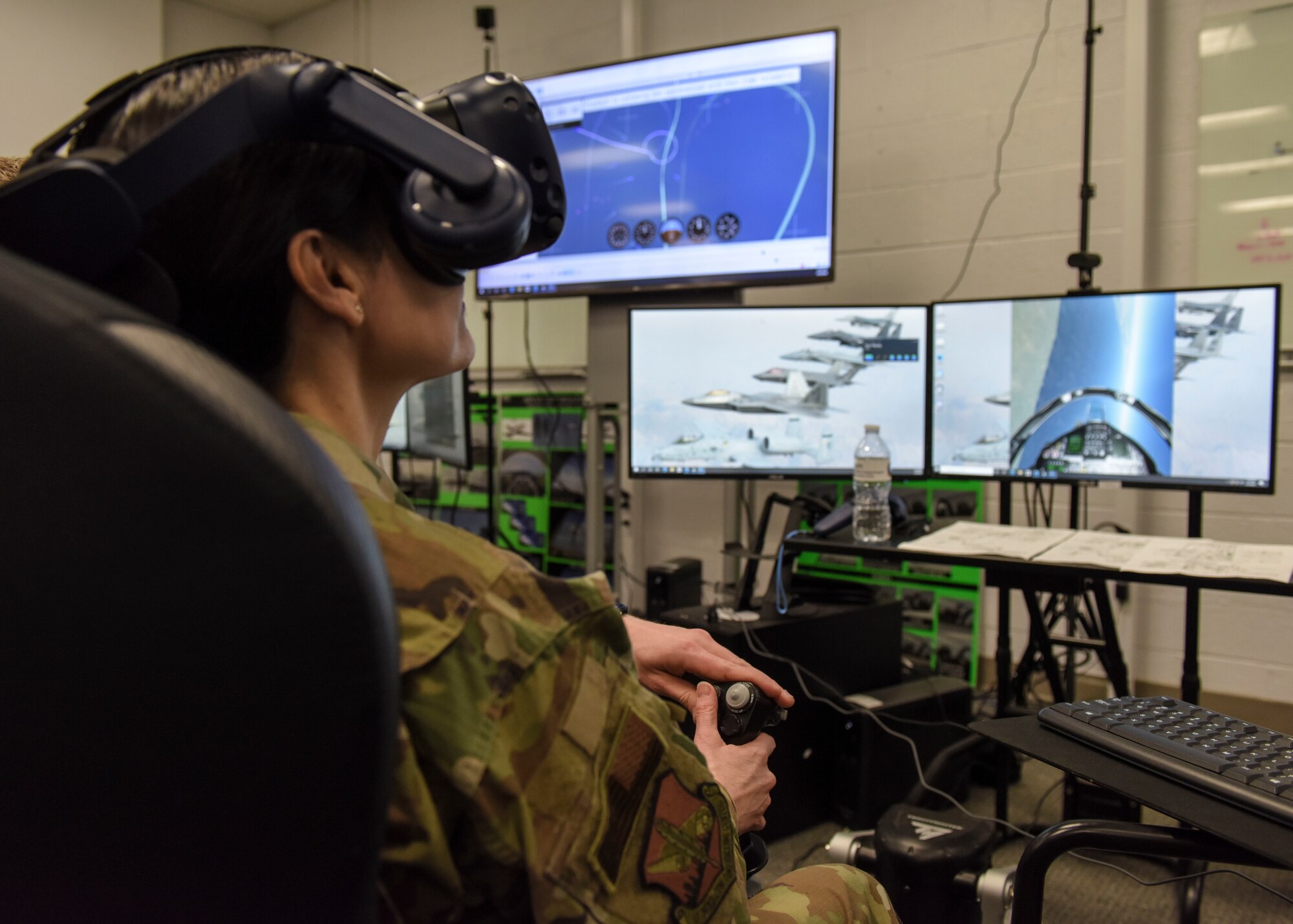 Brig. Gen. Alice Trevino, Air Force Installation Contracting Center commander, uses a virtual pilot training simulator at Sheppard Air Force Base, Texas, March 4, 2020. Student pilots use the virtual reality system to prepare themsleves for flight training missions as well as familiarization with flight controls. (U.S. Air Force photo by Senior Airman Ilyana A. Escalona