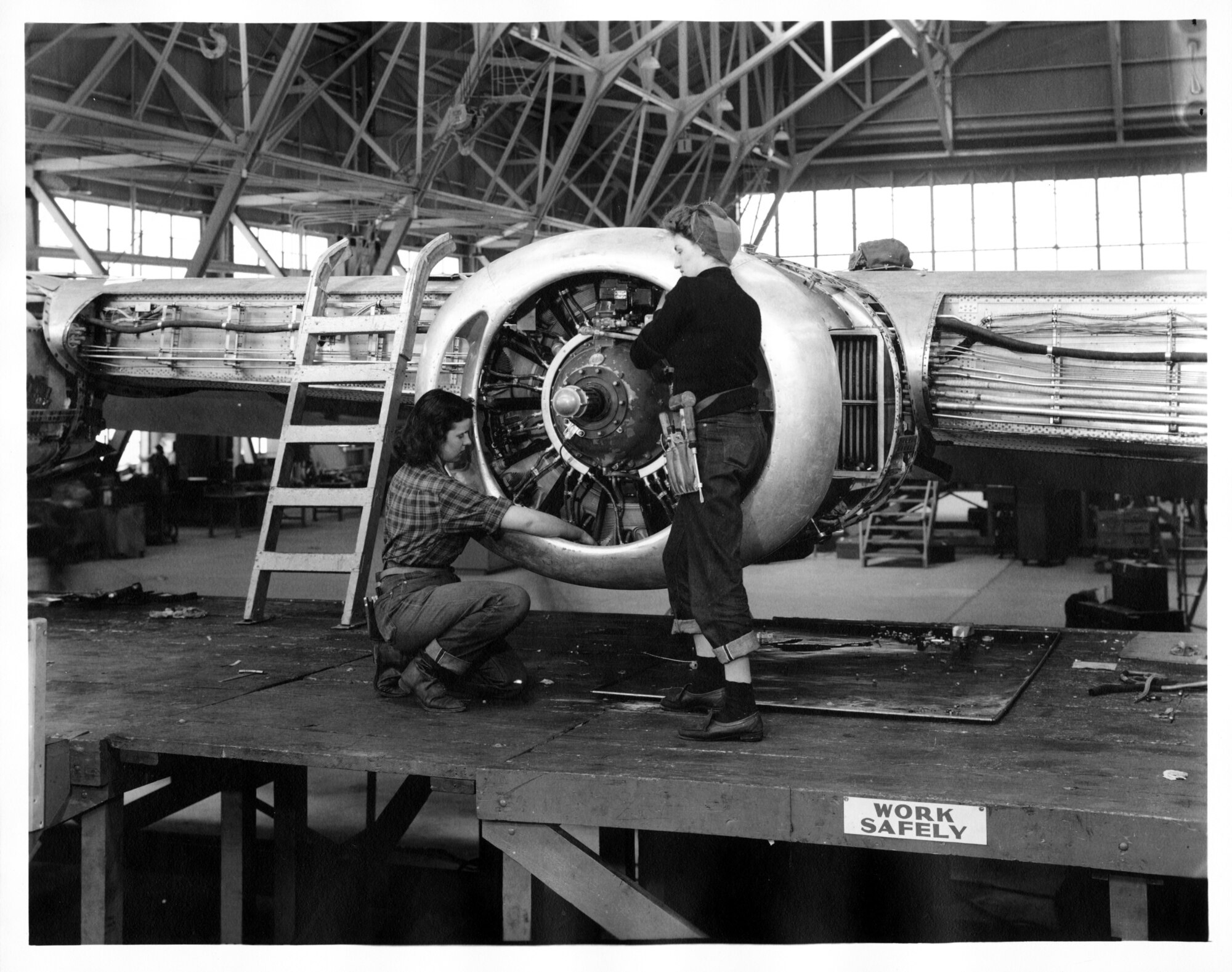 Women working on aircraft as part of the Ogden Air Depot’s maintenance lines during World War II.
