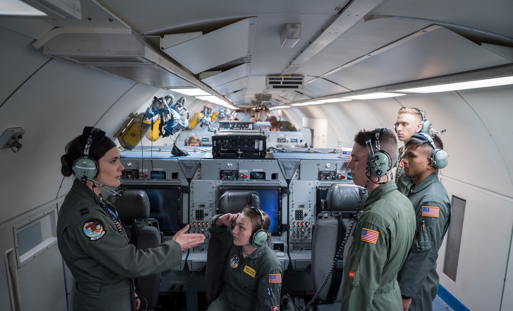 Aircrew members instructs cadets on in-flight operations