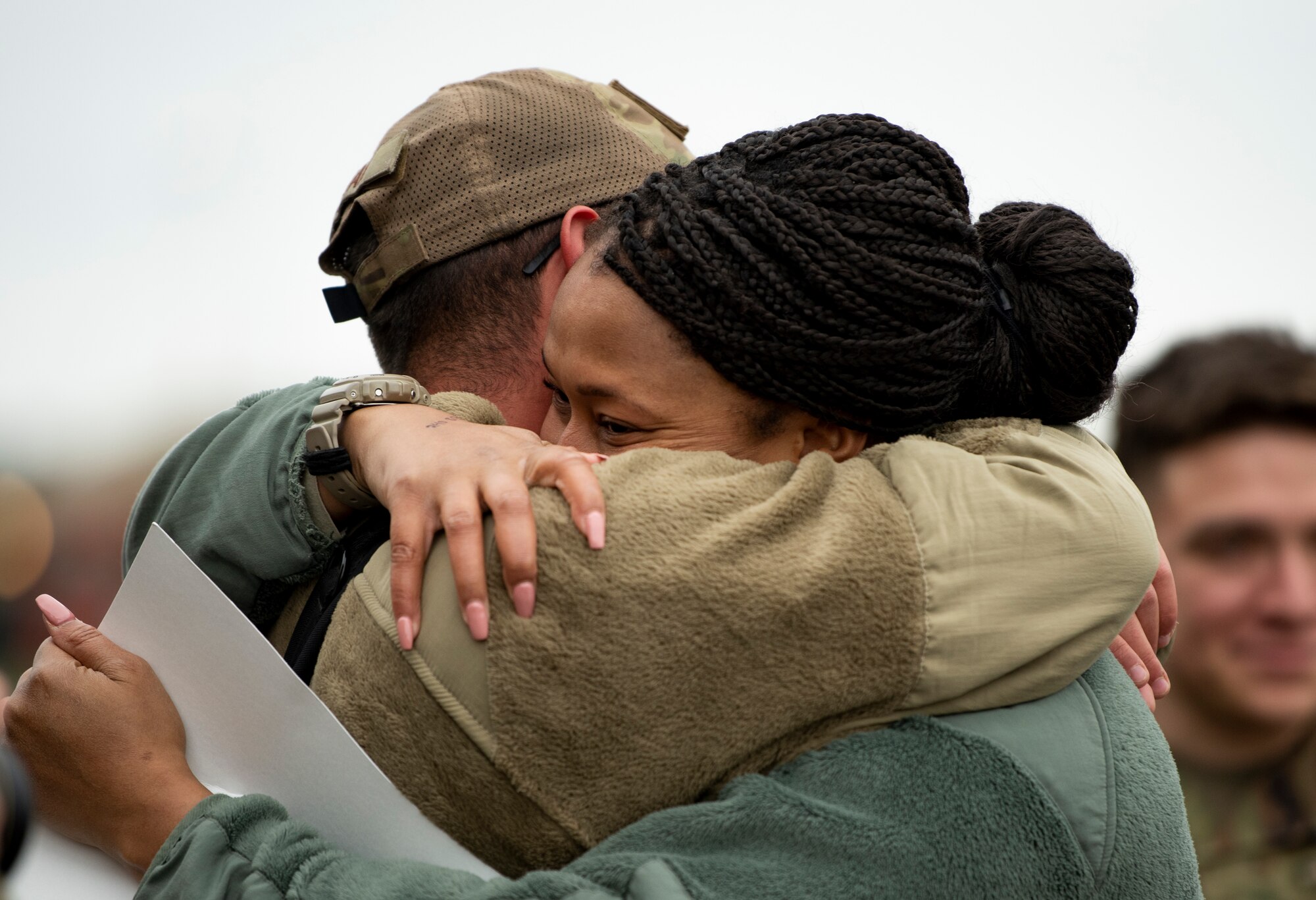 Friends and family welcome Airmen assigned to the 494th Fighter Squadron home from deployment at Royal Air Force Lakenheath, England, March 5, 2020. Airmen from the 48th Fighter Wing returned from a deployment supporting U.S. Air Force Central Command. (U.S. Air Force photo by Airman 1st Class Madeline Herzog)