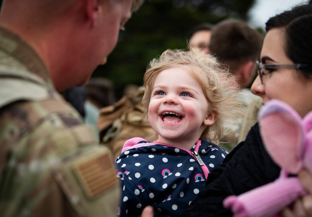 Friends and family welcome Airmen assigned to the 494th Fighter Squadron home from deployment at Royal Air Force Lakenheath, England, March 5, 2020. Airmen from the 48th Fighter Wing returned from a deployment supporting U.S. Air Force Central Command. (U.S. Air Force photo by Airman 1st Class Madeline Herzog)