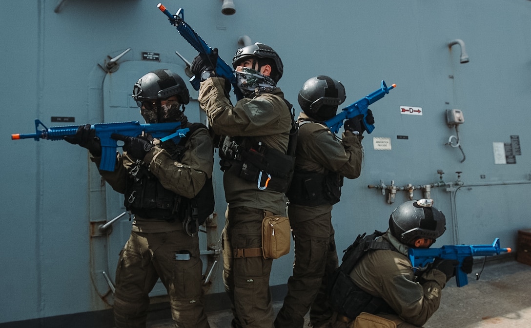 Operators with the United Arab Emirates’ (UAE) Critical Infrastructure and Costal Protection Agency provide security while conducting Visit, Board, Search, and Seizure training aboard the U.S.S. Forrest Sherman (DDG 98) during exercise Iron Defender 20 in the Arabian Gulf, March 2, 2020. Iron Defender 20 is a U.S. Naval Forces Central Command led bilateral exercise between the U.S. Navy, U.S. Coast Guard, and the UAE naval and air defense forces. Iron Defender 20 allows the U.S. Armed Forces to train bilaterally with the UAE Armed Forces to enhance maritime interoperability and strengthen our maritime security posture. (U.S. Marine Corps photo by Cpl. Jennessa Davey)