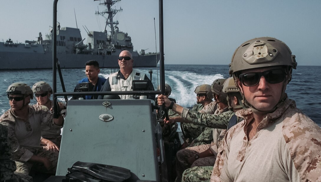 U.S. Marines, Navy and Coast Guard with 1st Reconnaissance Battalion, 1st Marine Division, return from conducting Visit, Board, Search, and Seizure training aboard the U.S.S. Forrest Sherman (DDG 98) during exercise Iron Defender 20 in the Arabian Gulf, March 2, 2020. Iron Defender 20 is a U.S. Naval Forces Central Command led bilateral exercise between the U.S. Navy, U.S. Coast Guard, and the UAE naval and air defense forces. Iron Defender 20 allows the U.S. Armed Forces to train bilaterally with the UAE Armed Forces to enhance maritime interoperability and strengthen our maritime security posture. (U.S. Marine Corps photo by Cpl. Jennessa Davey)