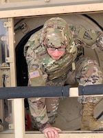 Maj. Raul Vidoudez, 3rd Medical Command - Deployment Support, exits a Humvee during a simulated rollover for HMMWV Egress Assistance Trainer (HEAT) training at Fort Hood, Tx., June 18, 2019. (Courtesy photo)
