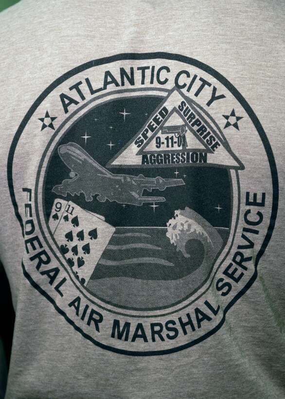 close up photograph of Federal Air Marshall Service emblem from Atlantic City New Jersey on the back of a T-shirt