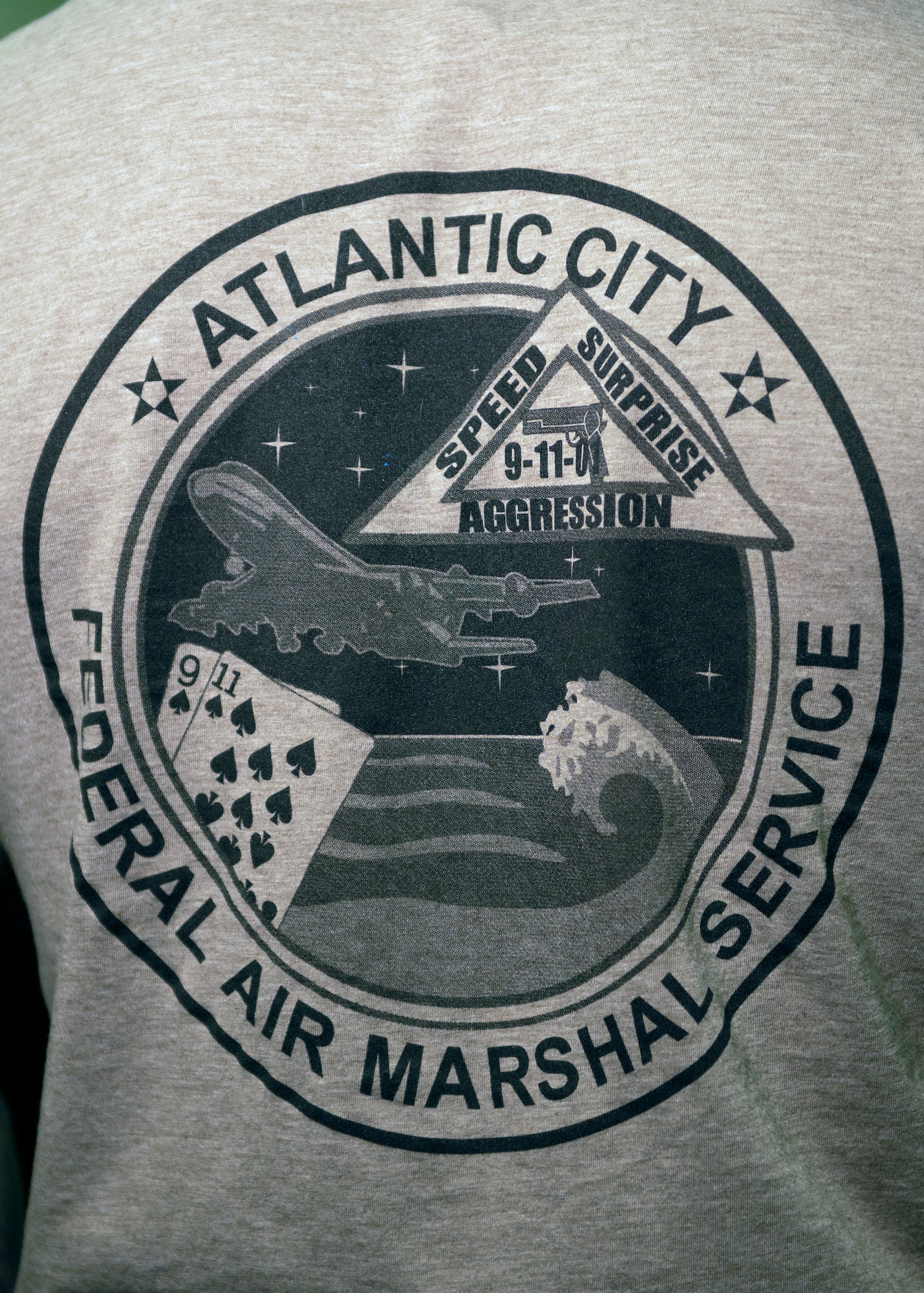 close up photograph of Federal Air Marshall Service emblem from Atlantic City New Jersey on the back of a T-shirt